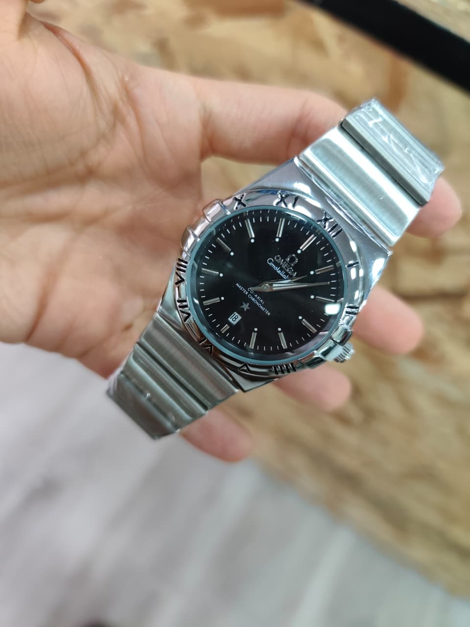 OMEGA